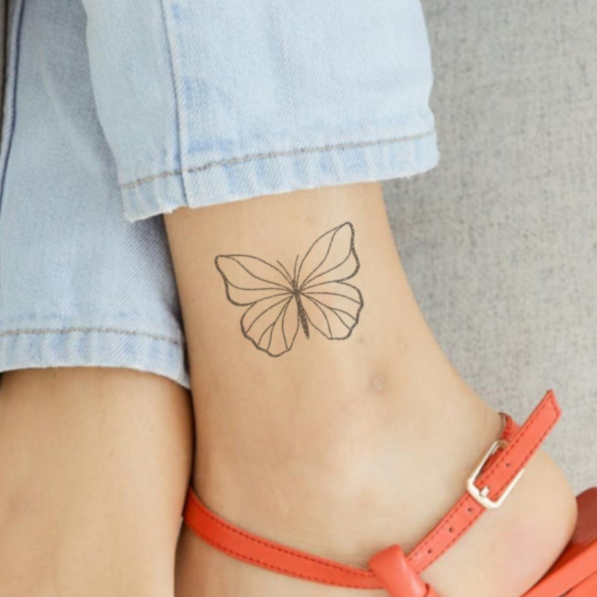 Ezra – Tatouage Papillon