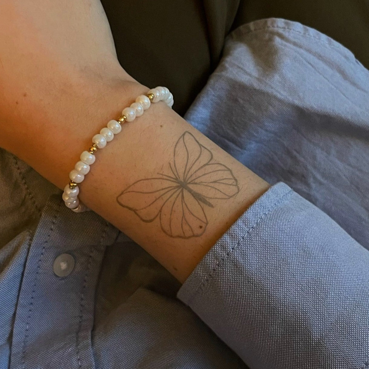 Ezra – Tatouage Papillon