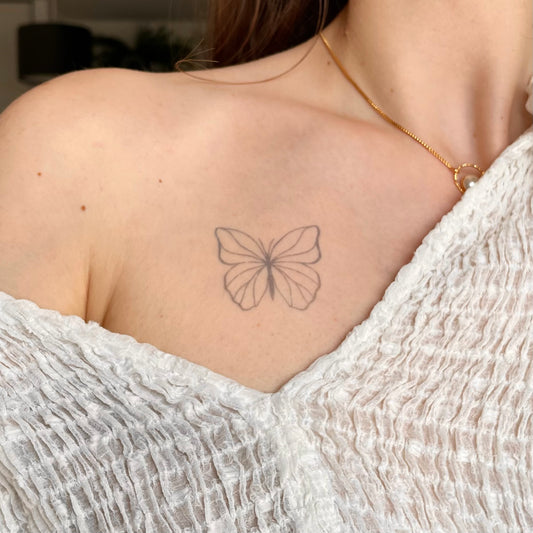 Ezra – Tatouage Papillon