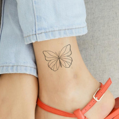 Ezra – Tatouage Papillon