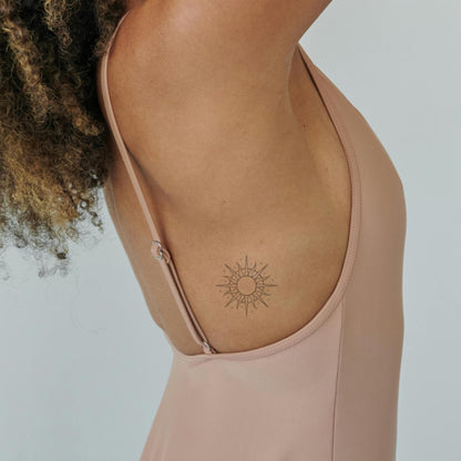 Zahara – Tatouage Soleil ornemental
